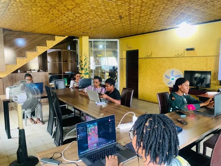 Residents studying together in a GAMAID Family house