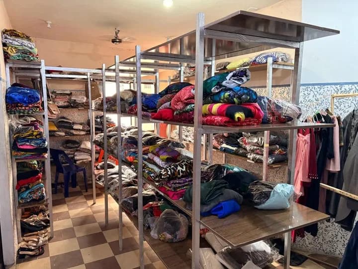 Clothing on display in the GAMAID Garments showroom