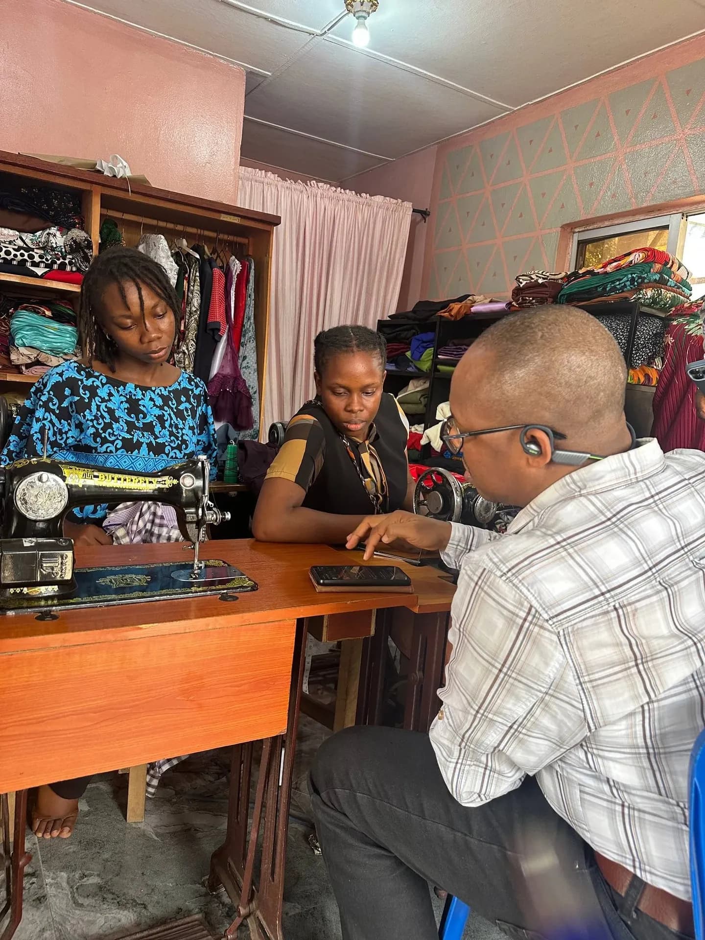 Trainees at work in the GAMAID tailoring class