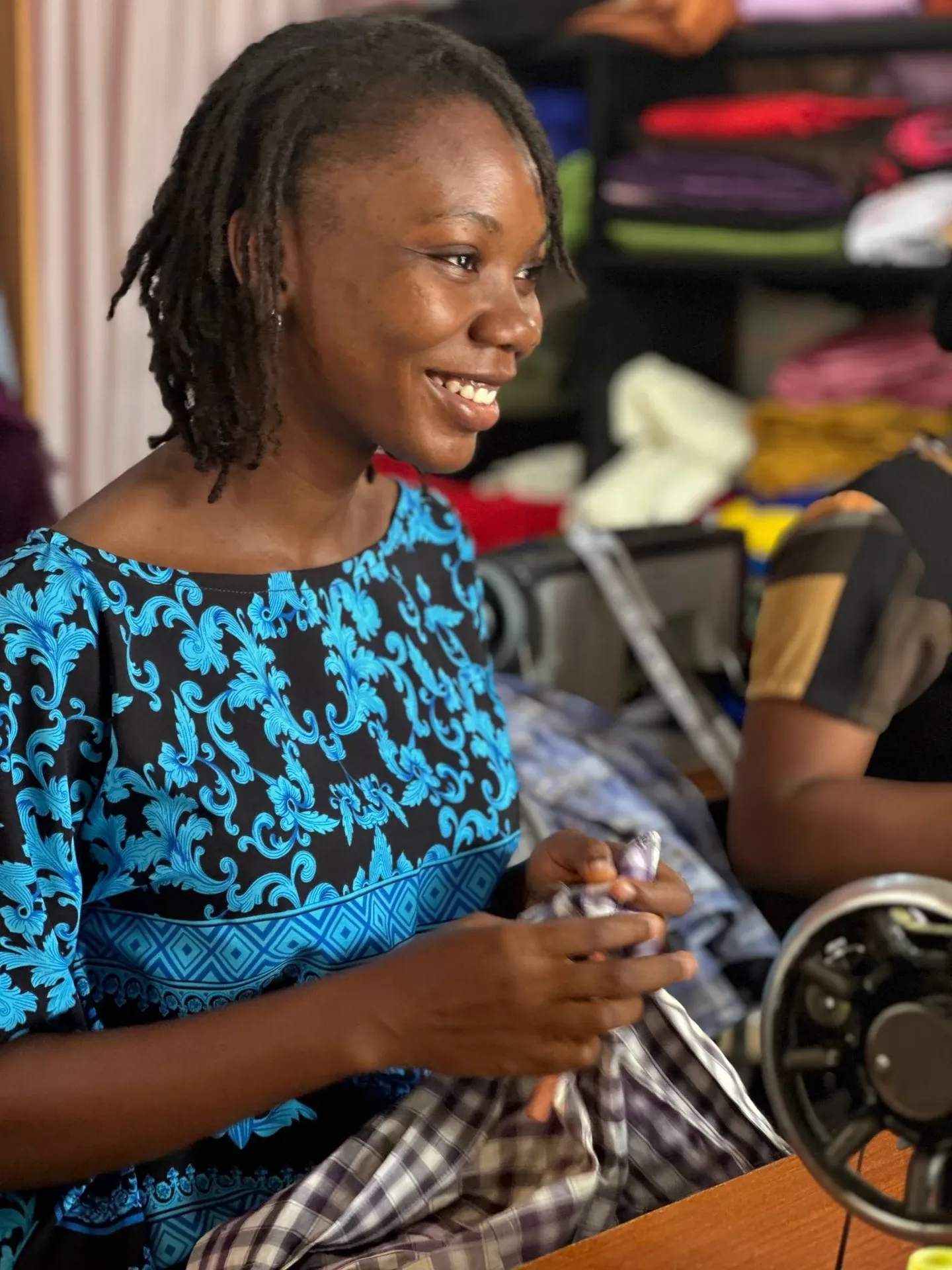 Trainees at work in the GAMAID tailoring class