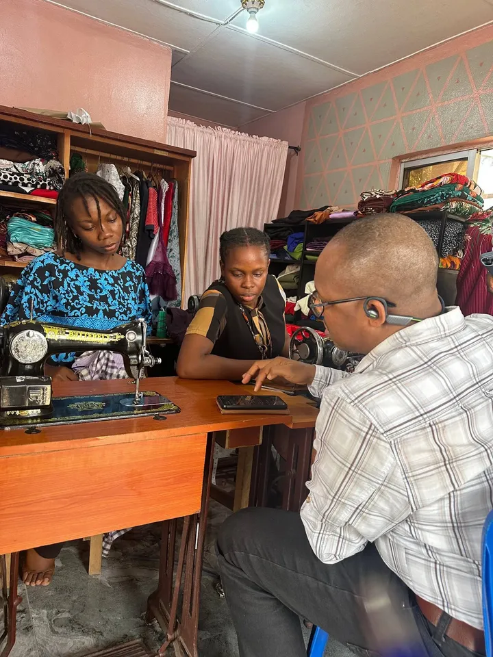 Trainees at work in the GAMAID tailoring class